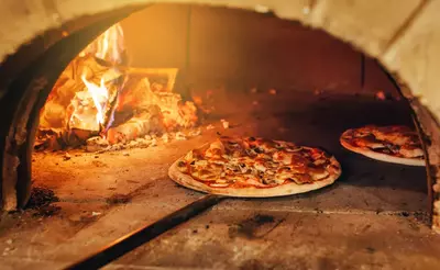 Pizza in brick oven