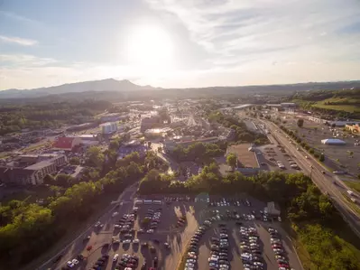 sun shining on pigeon forge