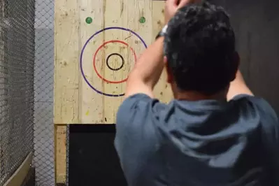 person throwing axes
