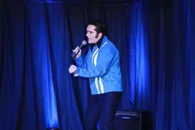 guy dressed like elvis