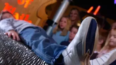 kid laying on bed of nails wonderworks