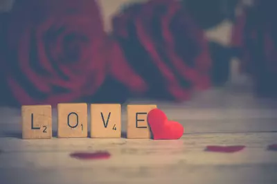 love spelled out with scrabble pieces