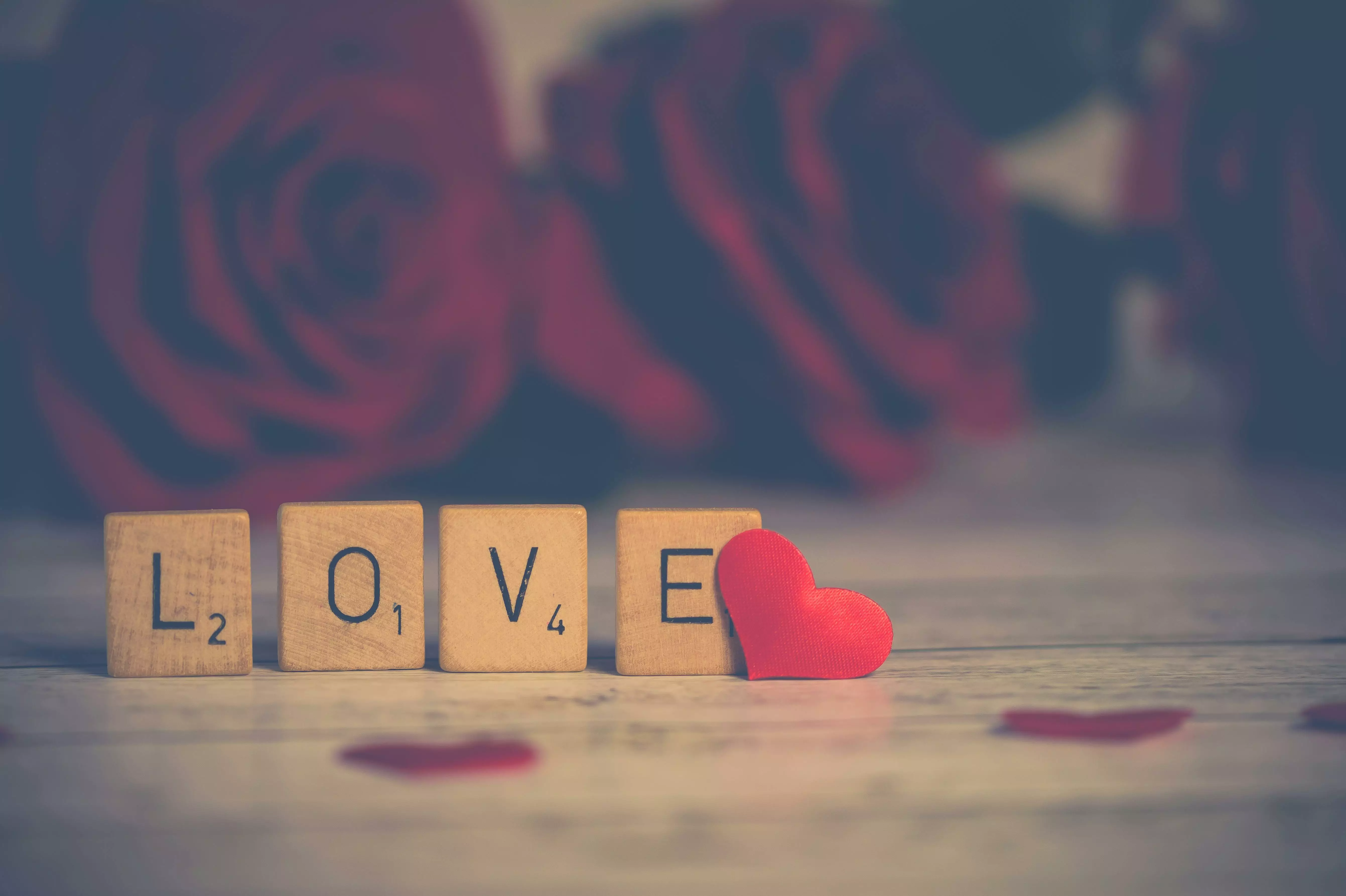 love spelled out with scrabble pieces