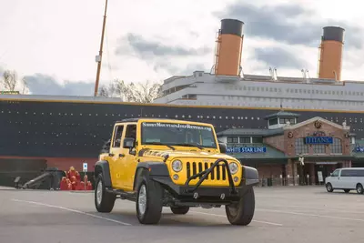 yellow jeep in front of the titanic museum