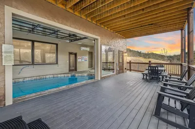 indoor pool and deck of mountain cabin