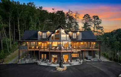 exterior of The Great Outdoors cabin during sunset