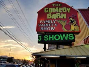 the comedy barn sign