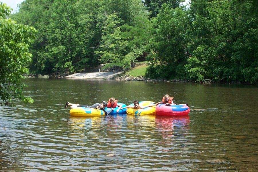 people tubing on the river