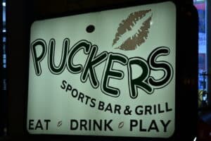 puckers sports bar sign at night in gatlinburg