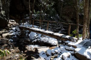 snow-covered footbridge on Alum Cave Trail