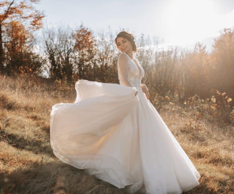 bride in beautiful dress posing in the Smoky Mountain forest in autumn