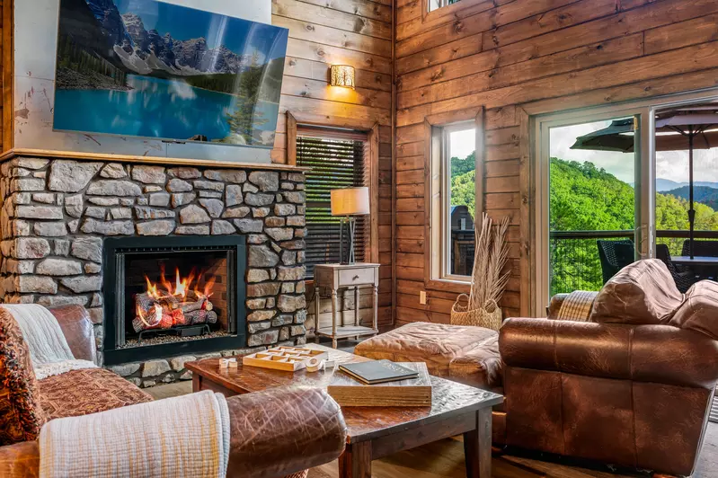 Kelly's Retreat living room with fireplace and mountain view